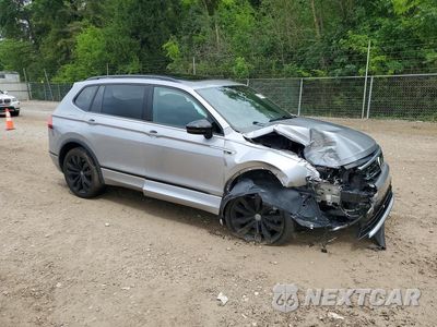 Czwarte zdjęcie samochodu z boku: 2021 VOLKSWAGEN TIGUAN SE VIN:3VV2B7AX0MM108131 - miniatura