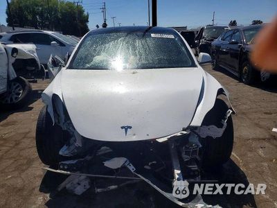 Piąte zdjęcie samochodu w środku: 2021 TESLA MODEL 3 VIN:5YJ3E1EB9MF066343 - miniatura