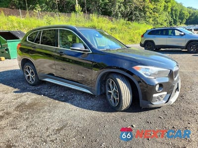 Czwarte zdjęcie samochodu z boku: 2016 BMW X1 XDRIVE28I VIN:WBXHT3C36G5E52670 - miniatura