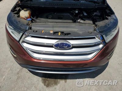 Zdjęcie 12 z 13 samochodu: 2015 FORD EDGE SEL VIN:2FMTK4J99FBC16587 - miniatura