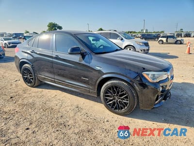 Czwarte zdjęcie samochodu z boku: 2015 BMW X4 XDRIVE28I VIN:5UXXW3C56F0M87301 - miniatura