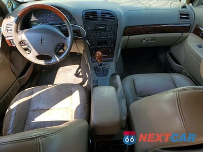 Zdjęcie 8 z 12 samochodu: 2000 LINCOLN LS VIN:1LNHM87A0YY782930 - miniatura