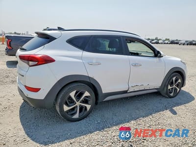 Trzecie zdjęcie samochodu z tyłu: 2018 HYUNDAI TUCSON LIMITED VIN:KM8J33A26JU763787 - miniatura