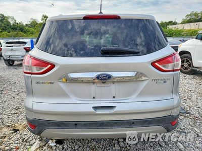 Zdjęcie 6 z 13 samochodu: 2016 FORD ESCAPE TITANIUM VIN:1FMCU9J99GUA63034 - miniatura