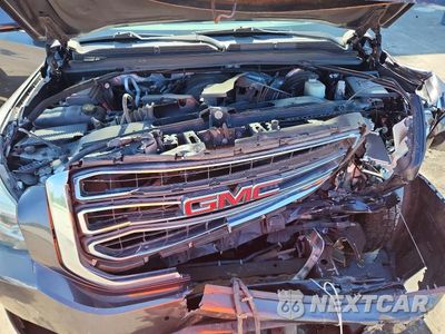 Zdjęcie 12 z 13 samochodu: 2015 GMC YUKON SLT VIN:1GKS1BKC3FR693616 - miniatura