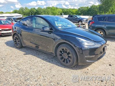 Czwarte zdjęcie samochodu z boku: 2023 TESLA MODEL Y VIN:7SAYGAEE6PF769013 - miniatura