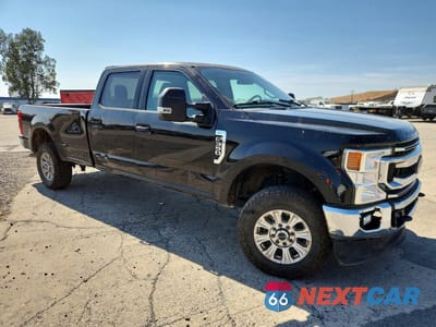 Czwarte zdjęcie samochodu z boku: 2022 FORD F350 SUPER DUTY VIN:1FT8W3B60NEF27812 - miniatura