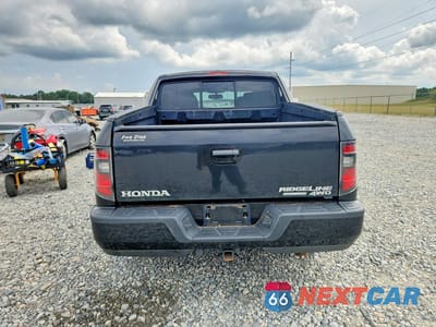 Zdjęcie 6 z 12 samochodu: 2014 HONDA RIDGELINE RTL-S VIN:5FPYK1F65EB009016 - miniatura