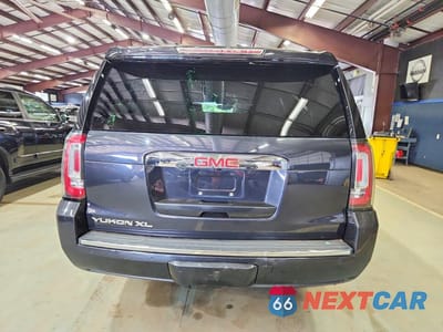 Zdjęcie 6 z 13 samochodu: 2020 GMC YUKON XL DENALI VIN:1GKS2HKJ5LR134465 - miniatura