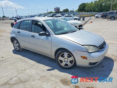 Czwarte zdjęcie samochodu z boku: 2005 FORD FOCUS ZX5 VIN:3FAFP37N75R141878 - miniatura