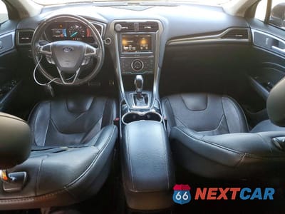 Zdjęcie 8 z 12 samochodu: 2014 FORD FUSION TITANIUM PHEV VIN:3FA6P0SU5ER195287 - miniatura