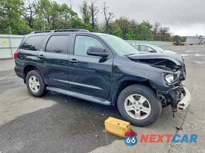 Czwarte zdjęcie samochodu z boku: 2015 TOYOTA SEQUOIA SR5 VIN:5TDBY5G10FS111974 - miniatura