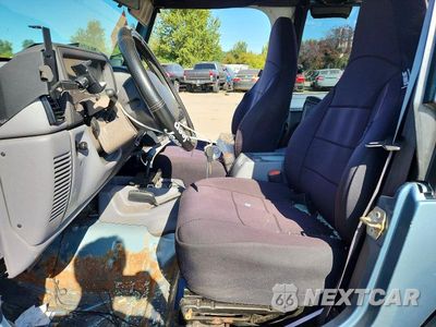 Zdjęcie 7 z 12 samochodu: 1998 JEEP WRANGLER / TJ SE VIN:1J4FY29P0WP744268 - miniatura