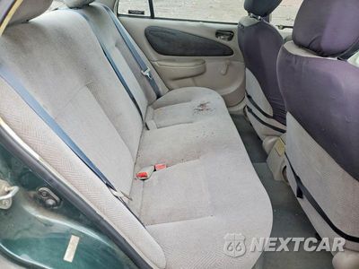 Zdjęcie 10 z 12 samochodu: 2000 CHEVROLET GEO PRIZM BASE VIN:1Y1SK5289YZ420801 - miniatura