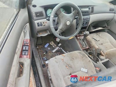Zdjęcie 8 z 12 samochodu: 2003 TOYOTA COROLLA LE VIN:JTDBR32E230028458 - miniatura