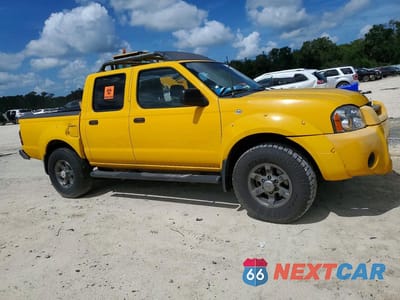 Czwarte zdjęcie samochodu z boku: 2004 NISSAN FRONTIER XE-V6 VIN:1N6ED27T74C442605 - miniatura