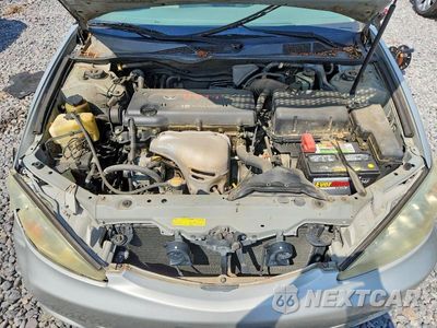 Zdjęcie 11 z 12 samochodu: 2003 TOYOTA CAMRY LE VIN:4T1BE32K33U701389 - miniatura