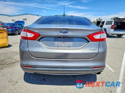 Zdjęcie 6 z 12 samochodu: 2014 FORD FUSION SE HYBRID VIN:3FA6P0LU2ER195519 - miniatura