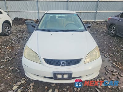Piąte zdjęcie samochodu w środku: 2004 HONDA CIVIC DX VP VIN:1HGEM22134L079021 - miniatura