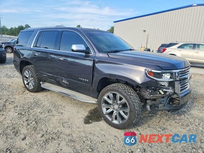 Czwarte zdjęcie samochodu z boku: 2015 CHEVROLET TAHOE C1500 LTZ VIN:1GNSCCKC0FR279020 - miniatura