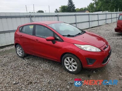 Czwarte zdjęcie samochodu z boku: 2012 FORD FIESTA SE VIN:3FADP4EJ6CM114839 - miniatura