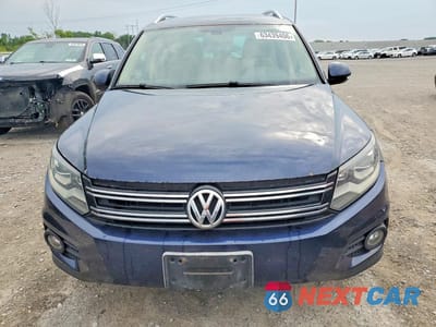Piąte zdjęcie samochodu w środku: 2013 VOLKSWAGEN TIGUAN S VIN:WVGBV3AXXDW561117 - miniatura