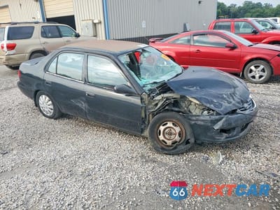 Czwarte zdjęcie samochodu z boku: 2002 TOYOTA COROLLA CE VIN:2T1BR12EX2C527517 - miniatura