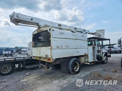 Trzecie zdjęcie samochodu z tyłu: 2003 INTERNATIONAL 4300 FORESTRY BUCKET TRUCK VIN:3HTMMAAN93N586640 - miniatura