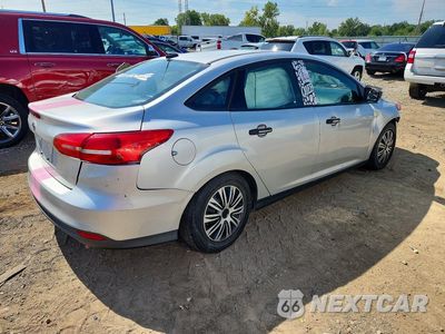 Trzecie zdjęcie samochodu z tyłu: 2016 FORD FOCUS S VIN:1FADP3E26GL356864 - miniatura