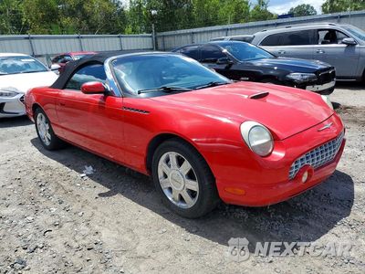 Czwarte zdjęcie samochodu z boku: 2004 FORD THUNDERBIRD VIN:1FAHP60AX4Y110237 - miniatura