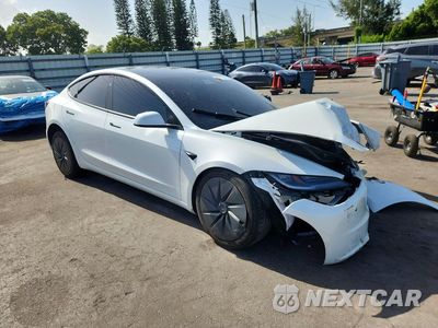 Czwarte zdjęcie samochodu z boku: 2026 TESLA MODEL 3 VIN:5YJ3E1EA2TF170064 - miniatura