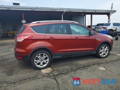 Trzecie zdjęcie samochodu z tyłu: 2016 FORD ESCAPE TITANIUM VIN:1FMCU9JX8GUA65646 - miniatura