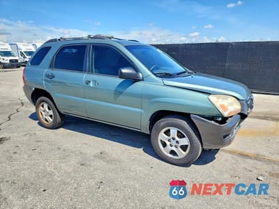 Czwarte zdjęcie samochodu z boku: 2007 KIA SPORTAGE LX VIN:KNDJF724477434936 - miniatura