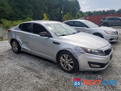 Czwarte zdjęcie samochodu z boku: 2013 KIA OPTIMA LX VIN:5XXGM4A77DG151055 - miniatura