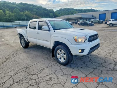 Czwarte zdjęcie samochodu z boku: 2015 TOYOTA TACOMA V6 VIN:5TFLU4EN7FX132802 - miniatura