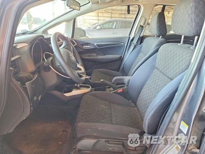 Zdjęcie 7 z 12 samochodu: 2016 HONDA FIT LX VIN:JHMGK5H54GS010369 - miniatura