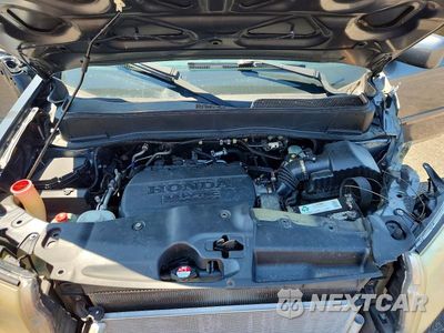 Zdjęcie 12 z 14 samochodu: 2013 HONDA PILOT EXL VIN:5FNYF3H59DB001416 - miniatura
