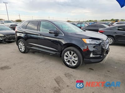 Czwarte zdjęcie samochodu z boku: 2022 FORD EDGE TITANIUM VIN:2FMPK4K99NBA38517 - miniatura
