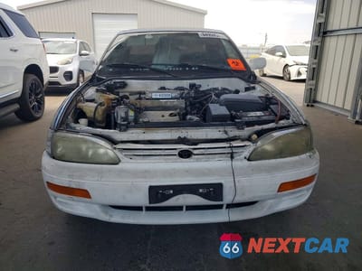 Piąte zdjęcie samochodu w środku: 1995 TOYOTA CAMRY LE VIN:4T1SK12E8SU478725 - miniatura