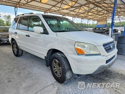 Czwarte zdjęcie samochodu z boku: 2004 HONDA PILOT EX VIN:2HKYF18454H541844 - miniatura