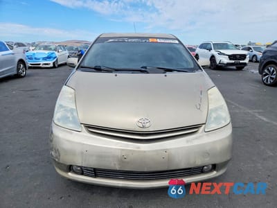 Piąte zdjęcie samochodu w środku: 2004 TOYOTA PRIUS BASE VIN:JTDKB20U940014812 - miniatura