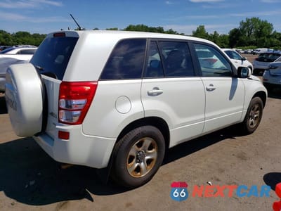 Trzecie zdjęcie samochodu z tyłu: 2012 SUZUKI GRAND VITARA PREMIUM VIN:JS3TD0D24C4100310 - miniatura