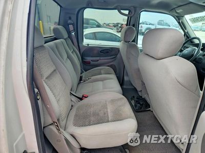 Zdjęcie 10 z 13 samochodu: 2003 FORD F150 SUPERCREW VIN:1FTRW07L63KA13818 - miniatura