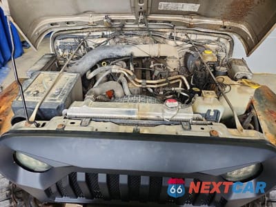 Zdjęcie 11 z 12 samochodu: 2002 JEEP WRANGLER / TJ X VIN:1J4FA39S82P745127 - miniatura