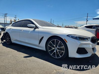 Czwarte zdjęcie samochodu z boku: 2020 BMW M850XI VIN:WBAGV8C09LBP48617 - miniatura
