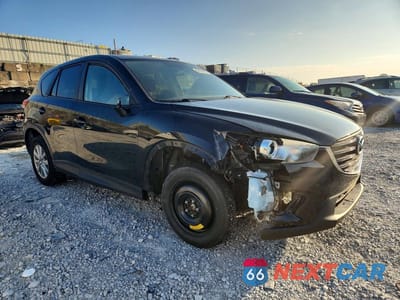 Czwarte zdjęcie samochodu z boku: 2016 MAZDA CX-5 TOURING VIN:JM3KE2CY8G0653314 - miniatura