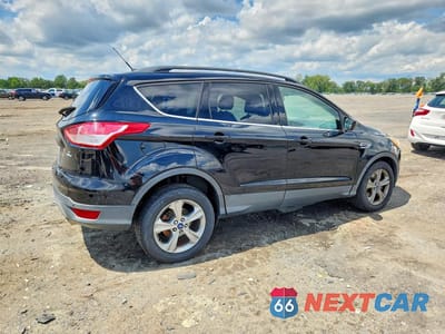 Trzecie zdjęcie samochodu z tyłu: 2016 FORD ESCAPE SE VIN:1FMCU9GXXGUC86706 - miniatura