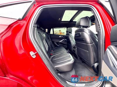 Zdjęcie 6 z 10 samochodu: 2021 BMW X6 M50I VIN:5UXCY8C09M9E51267 - miniatura