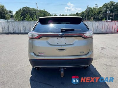 Trzecie zdjęcie samochodu z tyłu: 2017 FORD EDGE SEL VIN:2FMPK4J91HBC01084 - miniatura