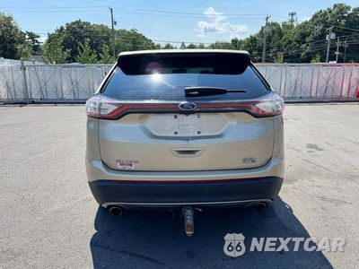 Trzecie zdjęcie samochodu z tyłu: 2017 FORD EDGE SEL VIN:2FMPK4J91HBC01084 - miniatura